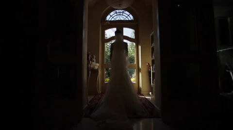 Bride at the window Stock Footage 49329118