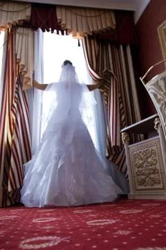 Bride at window Stock Photos