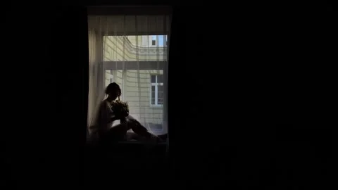 The bride on the windowsill Stock Footage 172138373