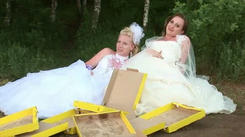 Brides and pizza (medium shot) Stock Footage 11291209
