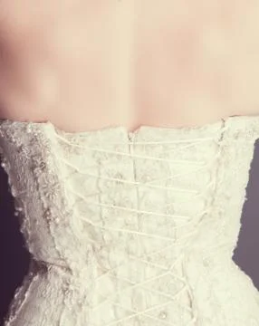 Brides back in wedding white dress Stock Photos