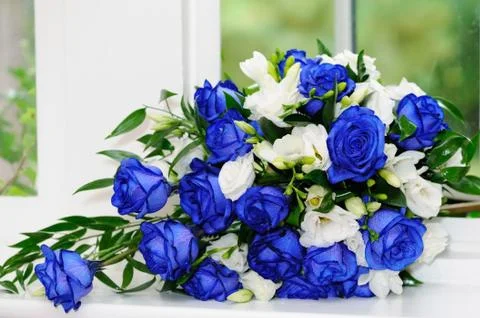 Brides bunch of blue roses Stock Photos