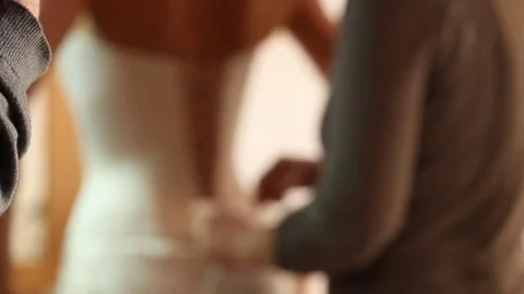 The bride's corset is wired Stock Footage 72118707