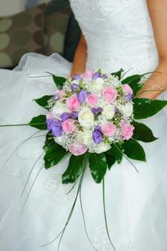 Brides flowers held by bride Stock Photos