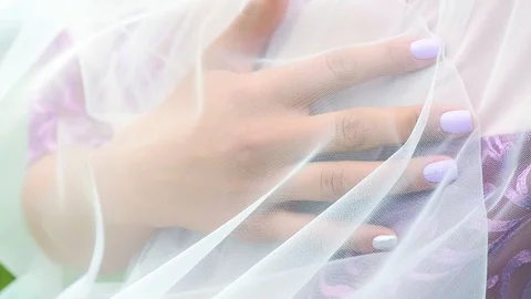 The bride's hand is romantically held on hand Stock Footage 90131640