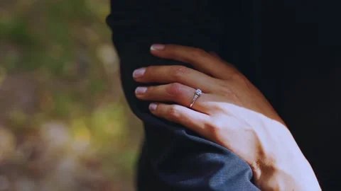 The bride's hand with the wedding ring on the groom Video stock 200943246