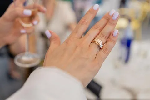 The bride's hand with a wedding ring Stock Photos