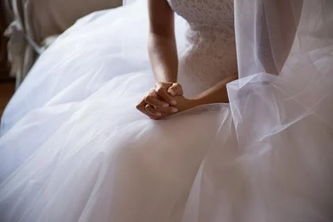 Bride's hands Stock Photos