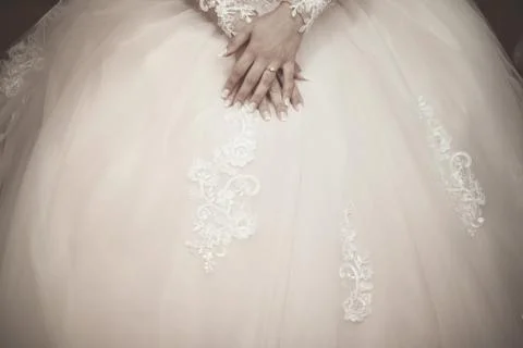 Bride's hands Stock Photos