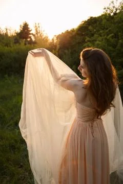 Bride's hands with a ring under a veil Stock Photos
