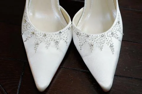 Brides shoes closeup Stock Photos