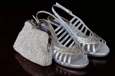 Brides silver shoes Stock Photos