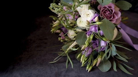 The bride's wedding bouquet is lying on the sofa in daylight. Stock Footage 120359220