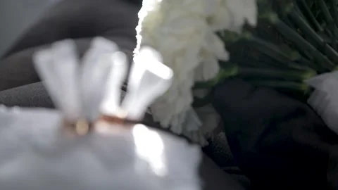 The bride's wedding bouquet is lying on the sofa in daylight. Stock Footage 209686365