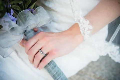 Bride's wedding ring on wedding day Stock Photos