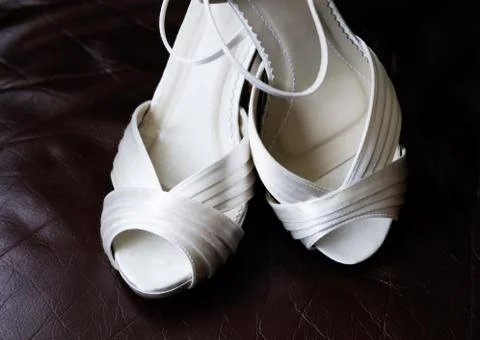 Brides white shoes Stock Photos