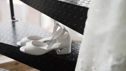 Bride's white wedding shoes Stock Footage 147664797