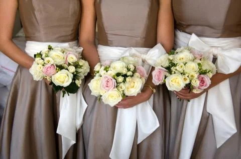 Bridesmaids with flowers Stock Photos