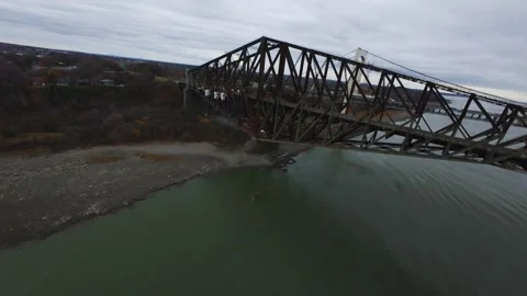 Bridge above river with highway flow Stock Footage 320588625