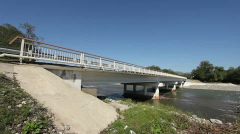 Bridge across mountain river 動画素材 38546847