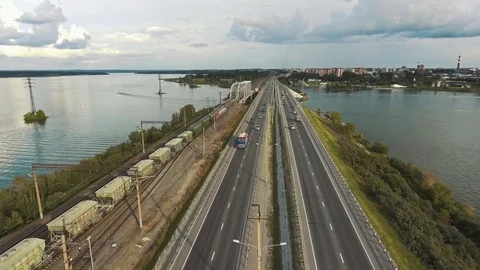 A bridge across the river with a highway (road) and a railway bridge. Stock-Footage 80731103