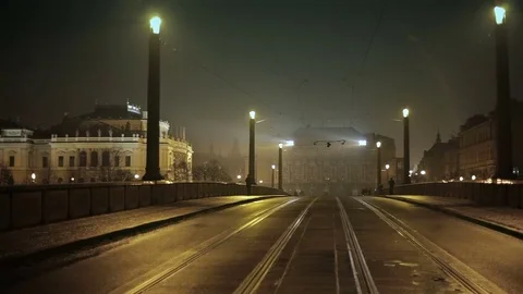 Bridge across the river with the tram track in the old Prague at night Stock Footage 73397451