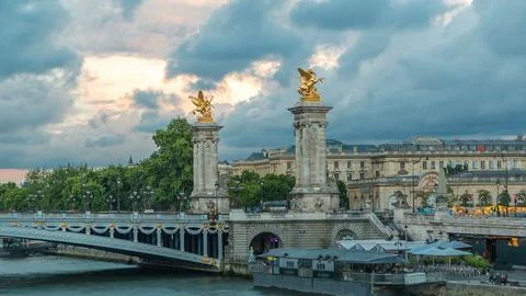 Bridge of Alexandre III spanning the river Seine timelapse. Paris. France. Stock Photos