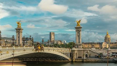 Bridge of Alexandre III spanning the river Seine timelapse. Paris. France. Stock Photos