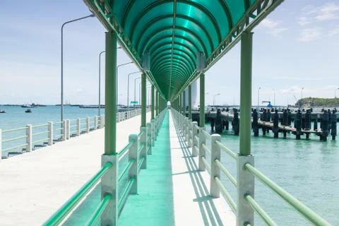 Bridge along the ocean. Stock Photos
