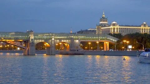 Bridge and building with lights and sailing ship at night Stock Footage 110779746