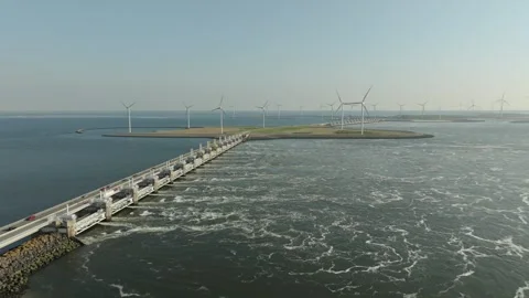 Bridge and flood barrier with wind engines on the coast of the Netherlands Video stock 325336646