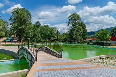 Bridge and pond Stock Photos