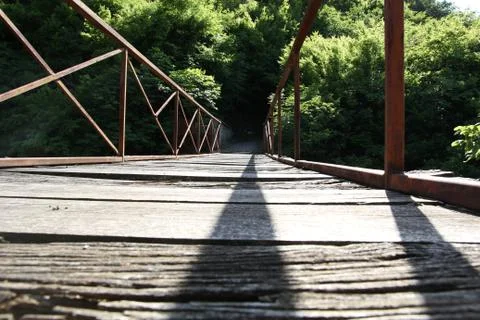 Bridge and the reflect sun Stock Photos