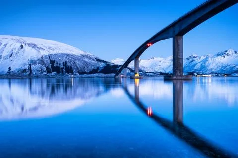 Bridge and reflection on the water surface. Natural landscape in the Lofoten Stock Photos
