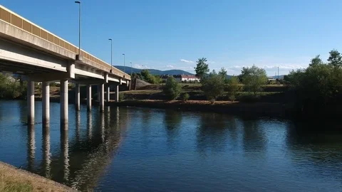 Bridge and river shot from drone going towards them Stock-Footage 78530192