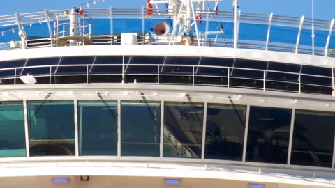 Bridge and top deck of a large cruise ship. Pilothouse or wheelhouse is a room Stock Footage 231361182
