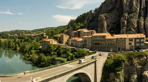 Bridge and traffic bellow Rocher de Baume in Sisteron southern France time lapse Stock Footage 53513175