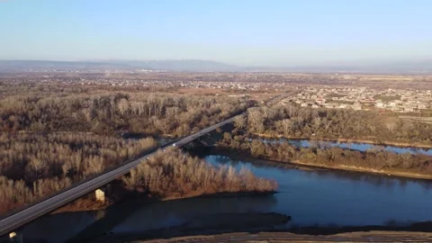 Bridge and traffic on the river Stock Footage 168580126