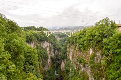 Bridge with an arch between two rock Stock Photos