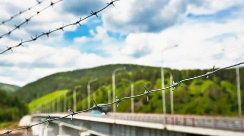 Bridge of barbed wire Stock Footage 39570963