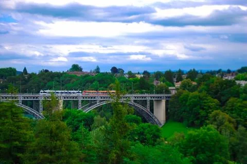 The bridge in Bern. Two trains go towards each other Stock Photos