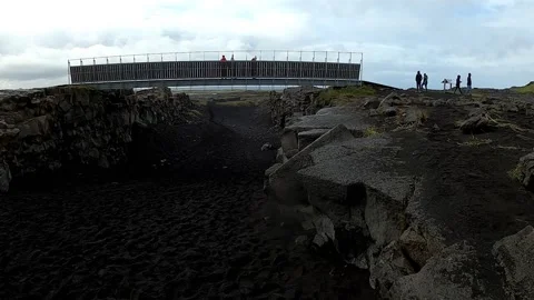 Bridge Between Continents over tectonic plates fissure in Iceland Stock Footage 335026974
