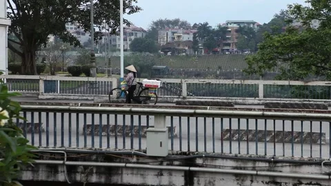 The bridge-border between Vietnam and China in near Sapa of Vietnam Stock Footage 164759734
