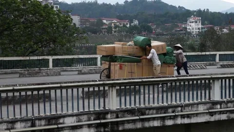 The bridge-border between Vietnam and China in near Sapa of Vietnam Stock Footage 164777758