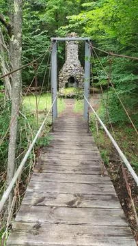 Bridge Cables Boads Planks River Creek Trees Fireplace Chimney Old Ruins Stock Photos