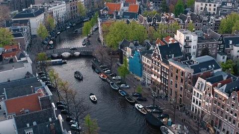 Bridge, canal and boats in Amsterdam Stock Footage