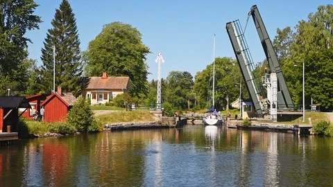 Bridge closing behind sailboat Stock Footage 95895507