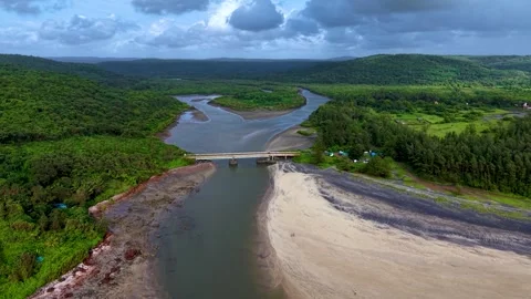 Bridge connecting Aare and Ware over creek near Ratnagiri, Maharashtra, India Stock Footage 320600318