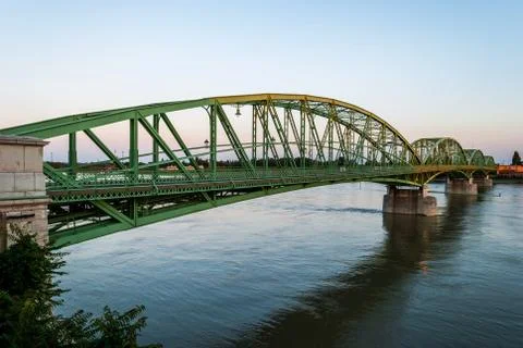Bridge connecting two countries, slovakia and hungaria before sunset Stock Photos