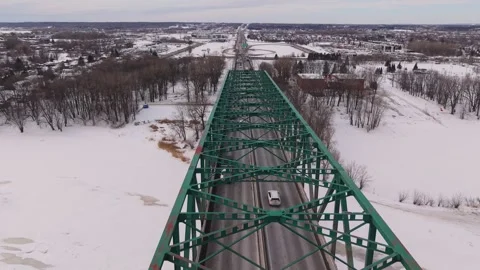 Bridge connection over frozen river winter minimal scene Stock Footage 329395508